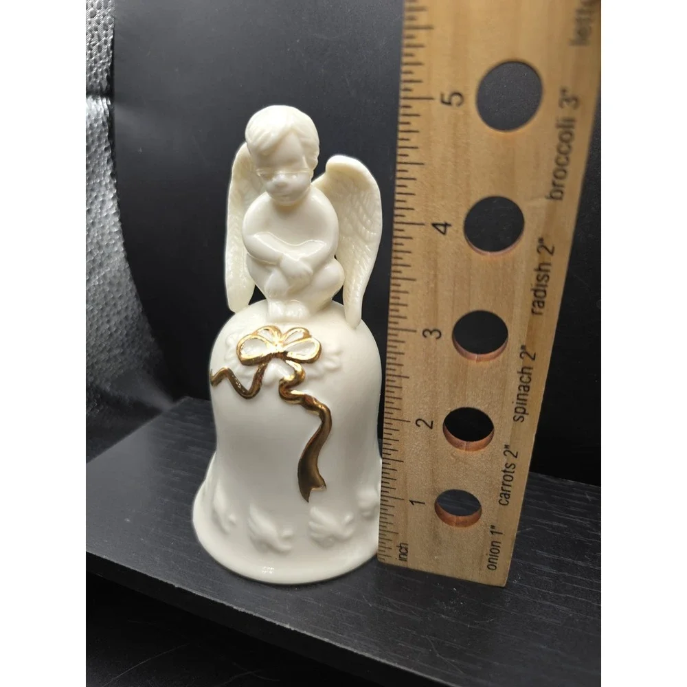 Bell Vintage Cherub Sitting On Porcelien Bell